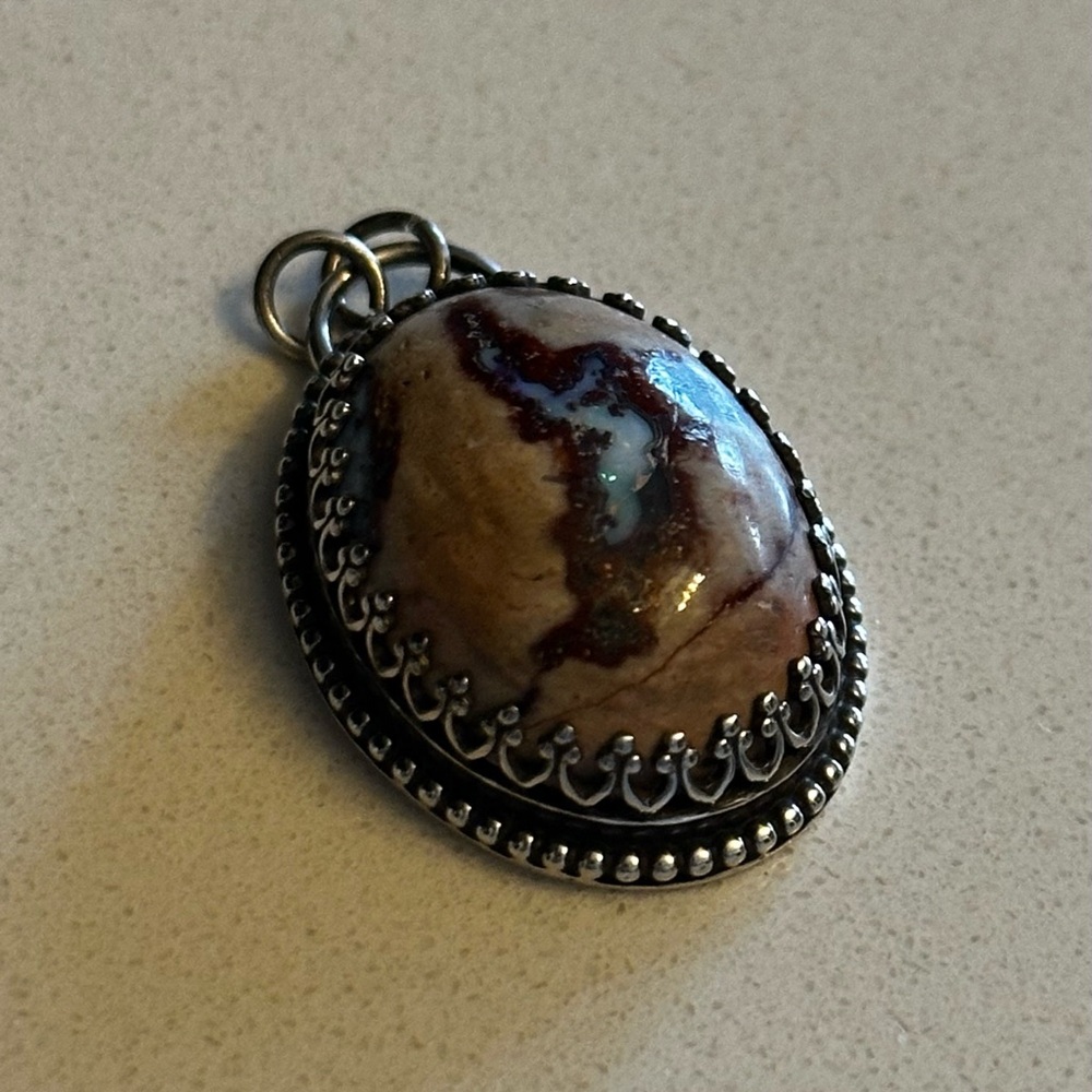 Sterling silver pendant with fire opal